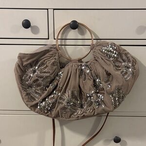 Anthropologie  Elegant Tan Embellished Women's Bag
Only used once.
